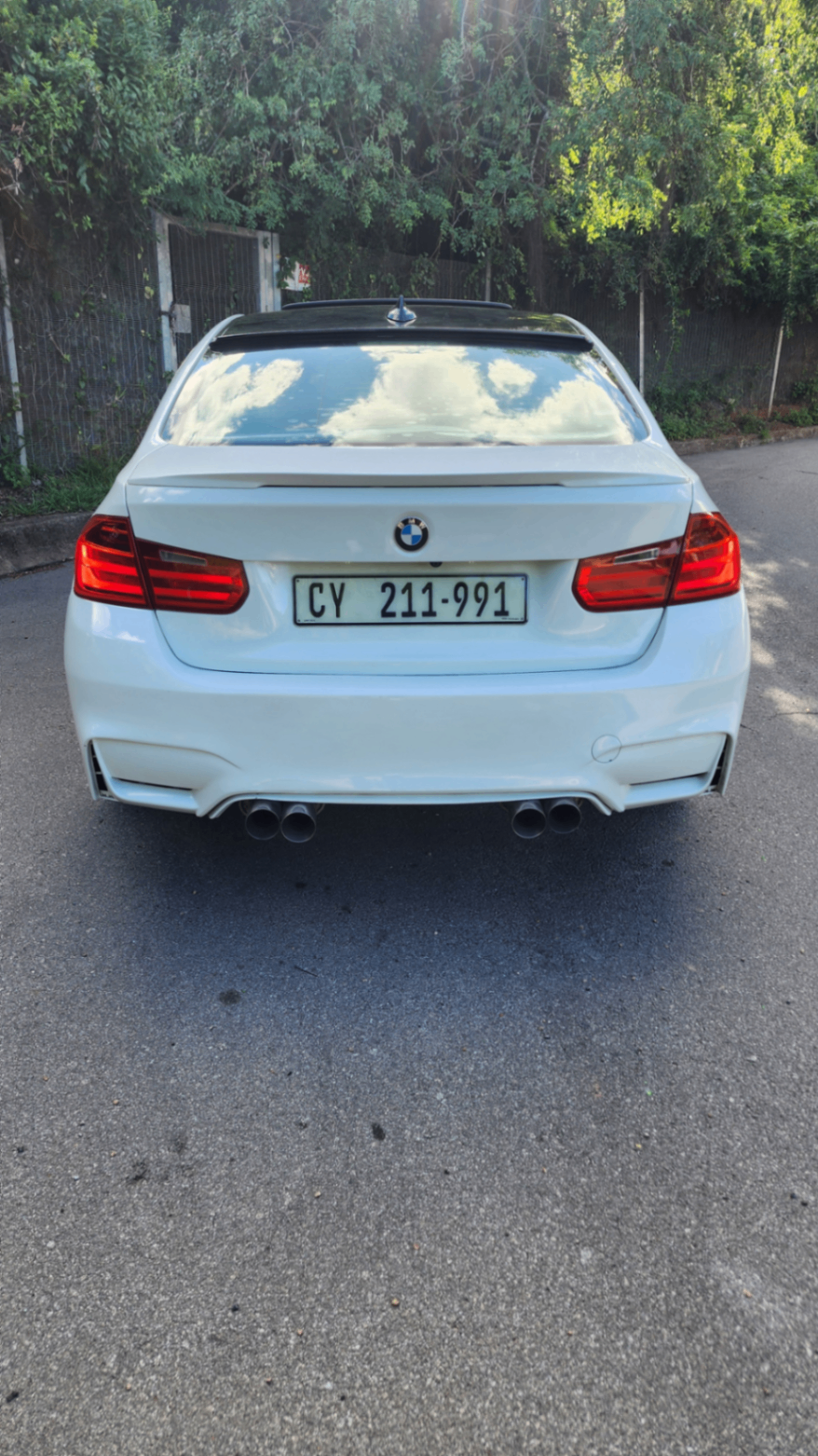 BMW 335i M3-style quad exhaust rear